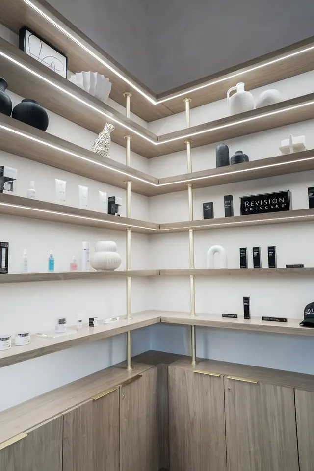 Retail skincare shelving interior at Cavina Wellness