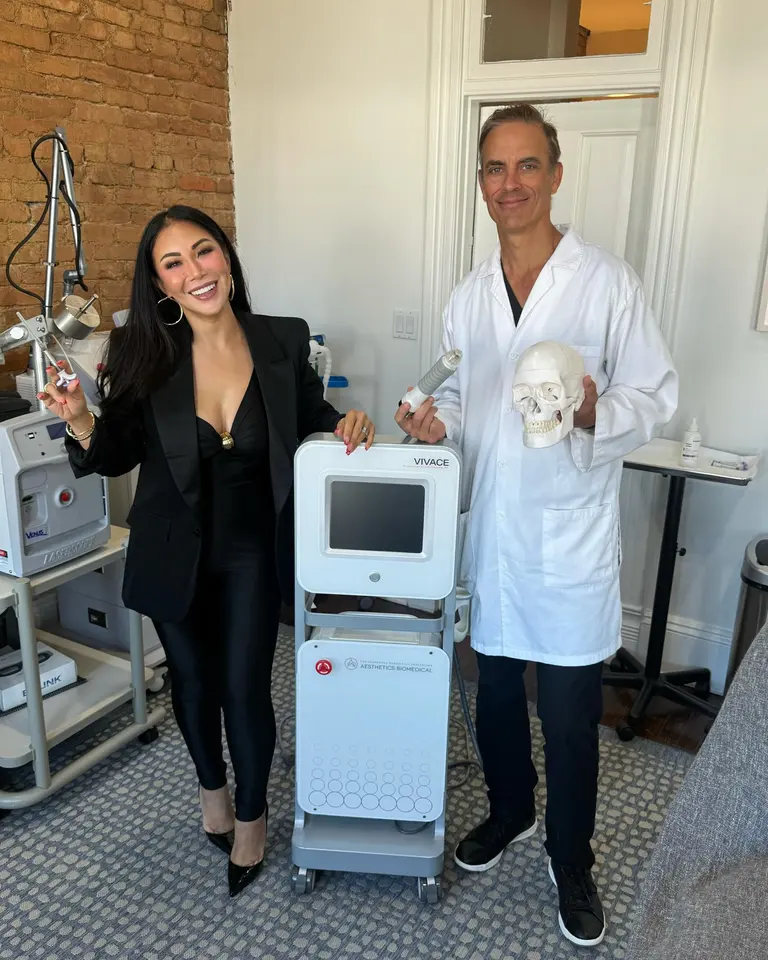 Hela Medical Spa staff demonstrating the Vivace RF microneedling device