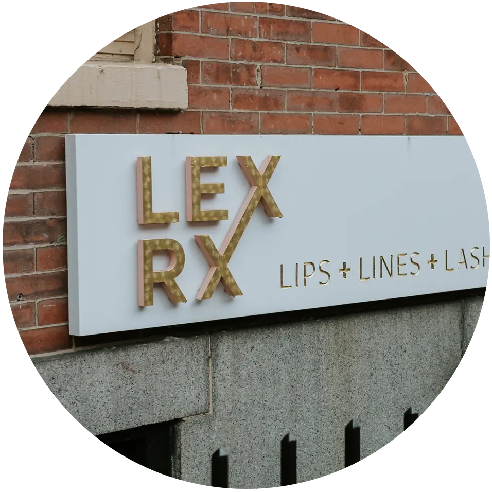 LexRx exterior sign mounted on brick storefront, Beacon Hill location