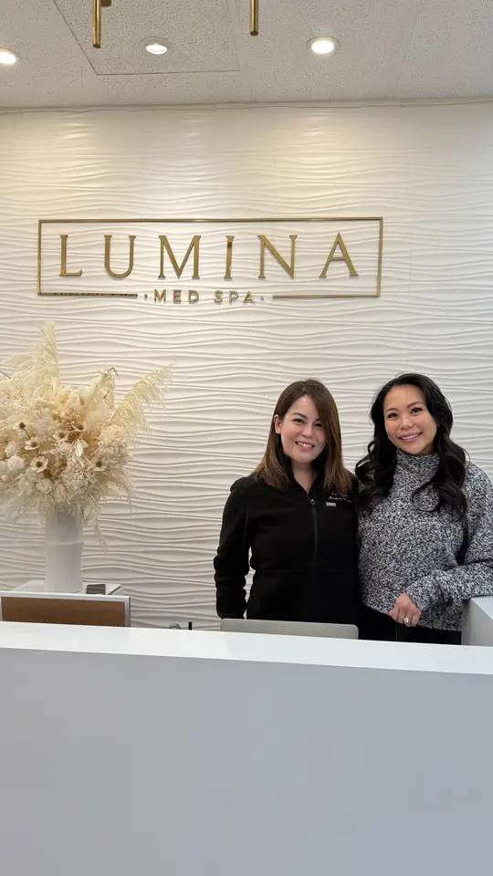 Staff at the Lumina Med Spa reception desk