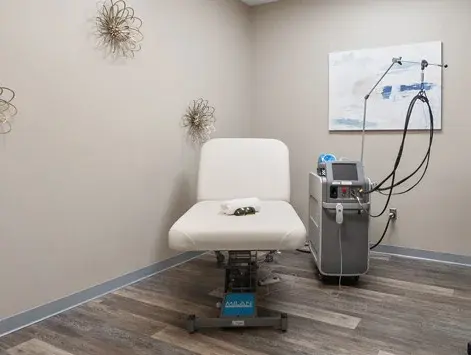 Treatment room with laser device at Milan Laser Buckhead