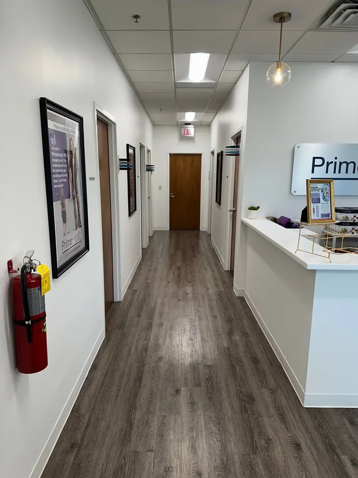 Hallway and front desk at PrimeHealth MD Alpharetta